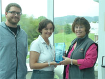 The Mountain State Award is presented to Cara Rose and Bill Saxton on behalf of the NRAO by Gail Hyer, Marketing Specialist for the Pocahontas County Convention and Visitors Bureau.