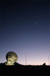 Figure 1: The first ALMA production antenna validates the ALMA system through observations of the Moon.