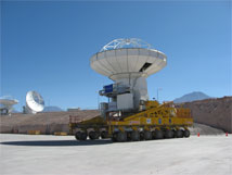 Figure 2: The first Vertex production antenna is carried into the testing area of the OSF Technical Facility by the transporter on 6 Feb.