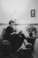 Alice Nelson reading in her Colby Junior College [New London, NH] resident faculty room