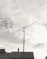 John D. Kraus on the roof of 1854 with antenna