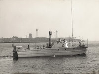 John D. Kraus on the bridge of a boat in Boston Harbor