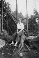 Alice Nelson on stump, New London NH area after hurricane