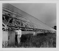 John D. Kraus beside Big Ear reflector, before ground plane construction