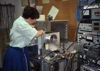 Working with a Dewar in the Central Development Laboratory in Charlottesville, VA, August 1993