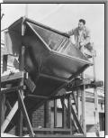 [Doc Ewen looks into the horn antenna, 1950]